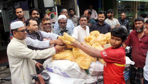 সিলেট মোটরসাইকেল পার্টস মার্চেন্ট এসোসিয়েশনের উদ্যোগে খাদ্যসামগ্রী বিতরণ